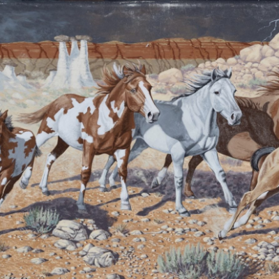 Mural of horses running in Hudson, Wyoming, showcasing local art as one of the unique things to do in Hudson WY.