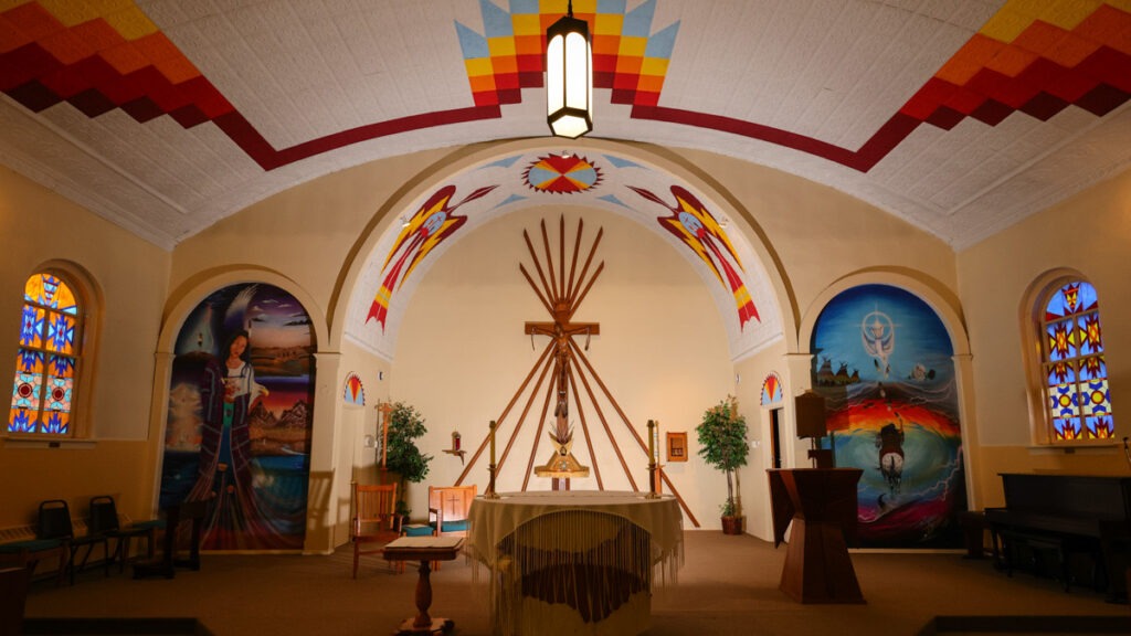 Interior of Saint Stephen’s Indian Mission Catholic Church on the Wind River Reservation, a must-visit site for cultural and spiritual things to do in the area.